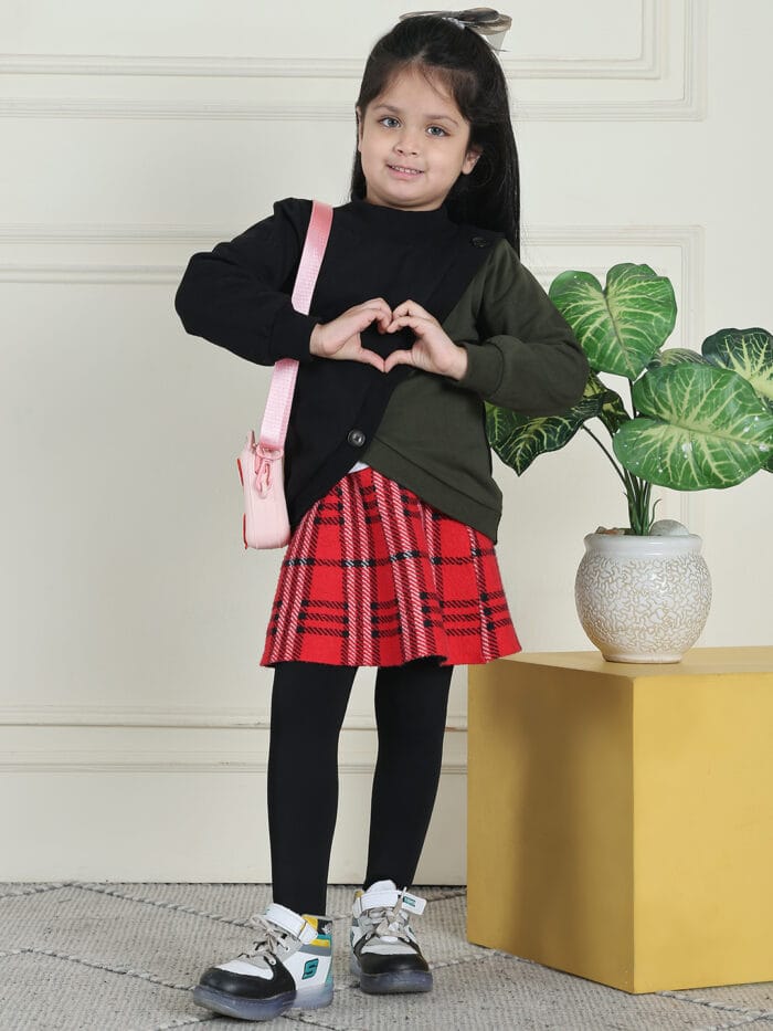 Girl Girl Black and Olive Two-Tone Pullover features a ribbed front with decorative buttons